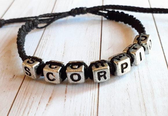 2/$15 Scorpio Bracelet Handmade Scorpio bracelet made with black waxed cording and silver letter…