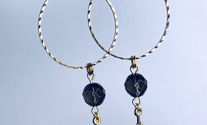 ‘B**** Don’t Kill My Vibe’ Smoky Quartz Gold Plated Stainless Steel Hoops with Feather Charms